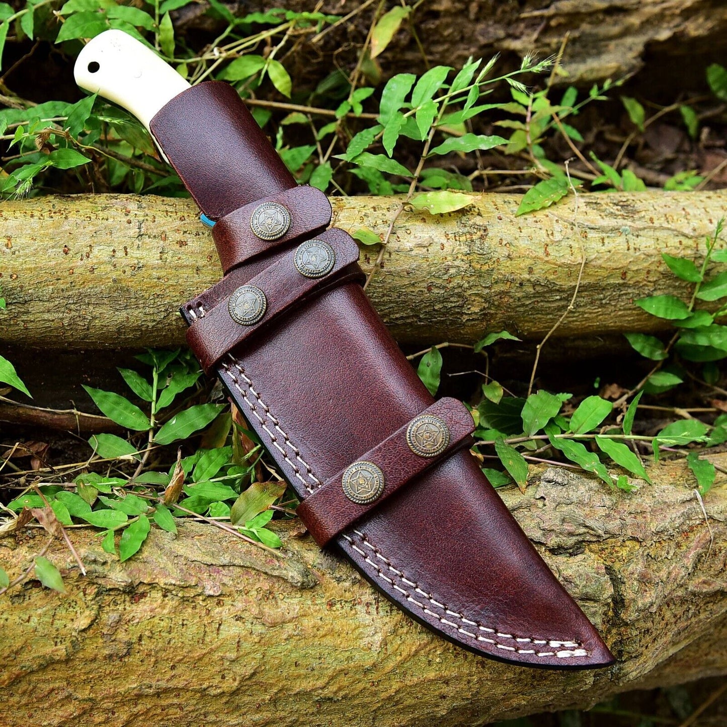 "10-inch Damascus steel hunting knife with unique camel bone and resin handle and leather sheath
