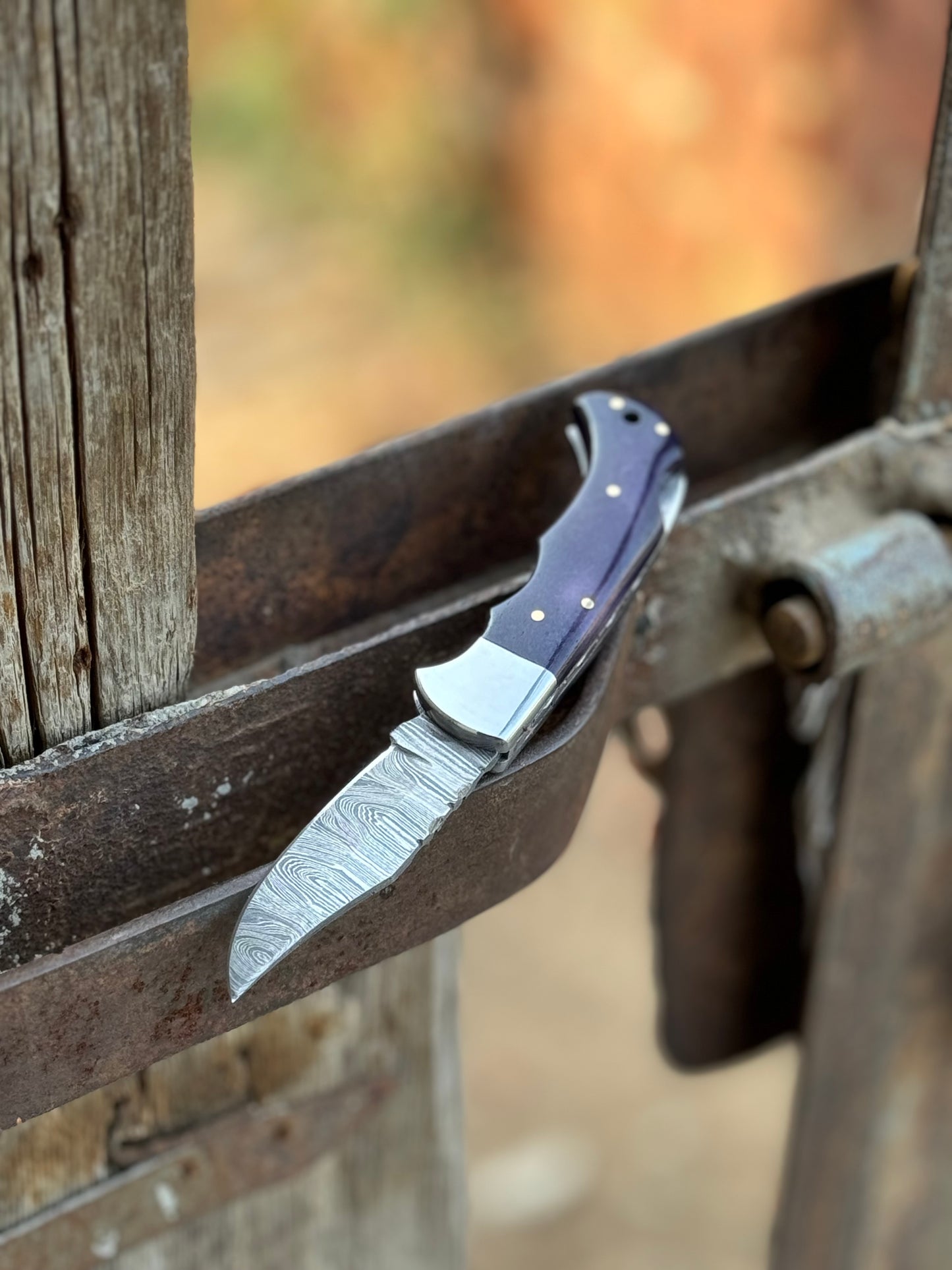 Custom handmade Damascus steel pocket knife