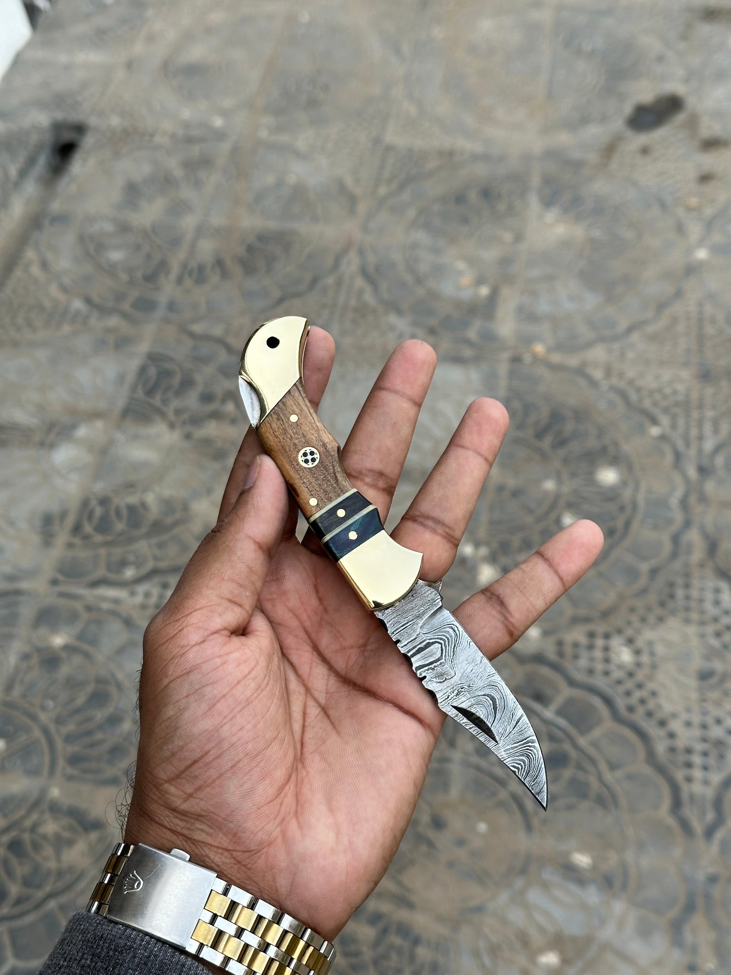 Custom handmade Damascus steel folding knife