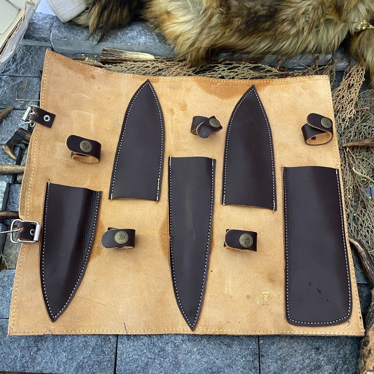Artisan Damascus knife set with steel bolsters and hand-forged blades, 9” to 13” in size