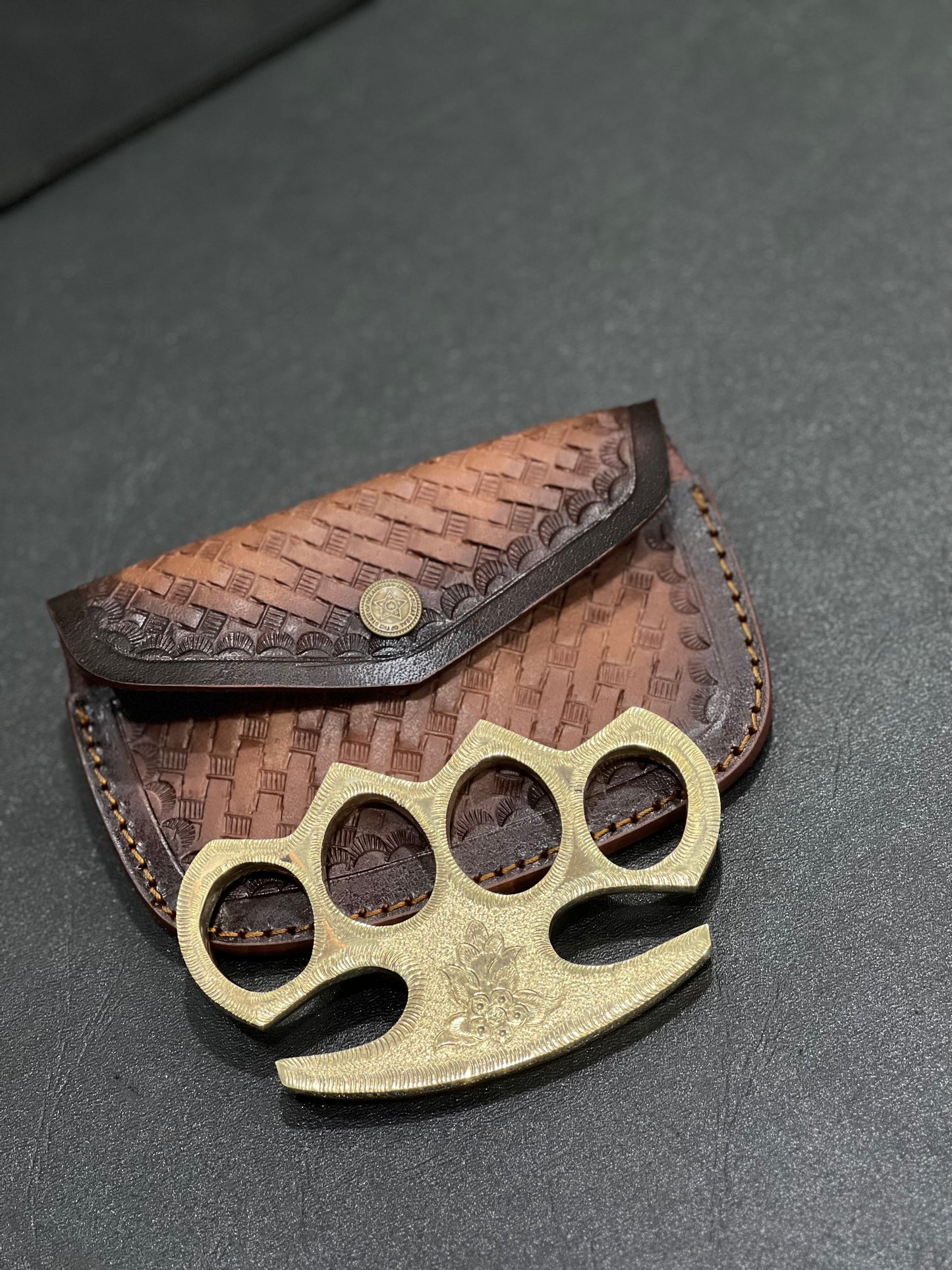Close-up of Engraved Brass Knuckles