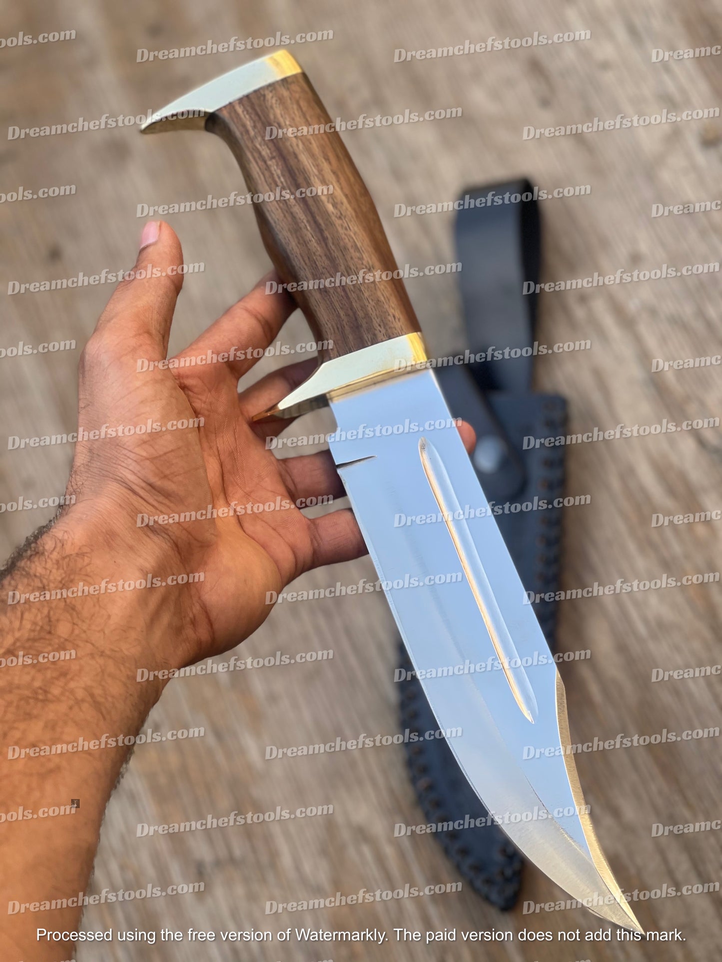 Custom handmade 13-inch D2 steel hunting Bowie knife with an olive wood handle, brass guard, and a beautiful leather sheath