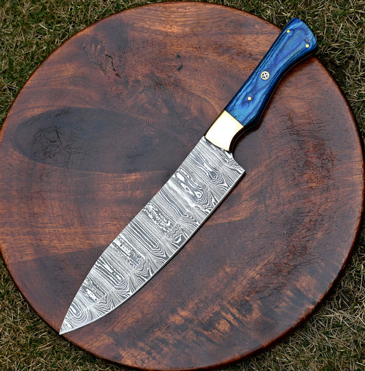 Custom handmade 7-inch Damascus steel chef knife with pakkawood handle and brass bolster, ideal for professional and home chefs