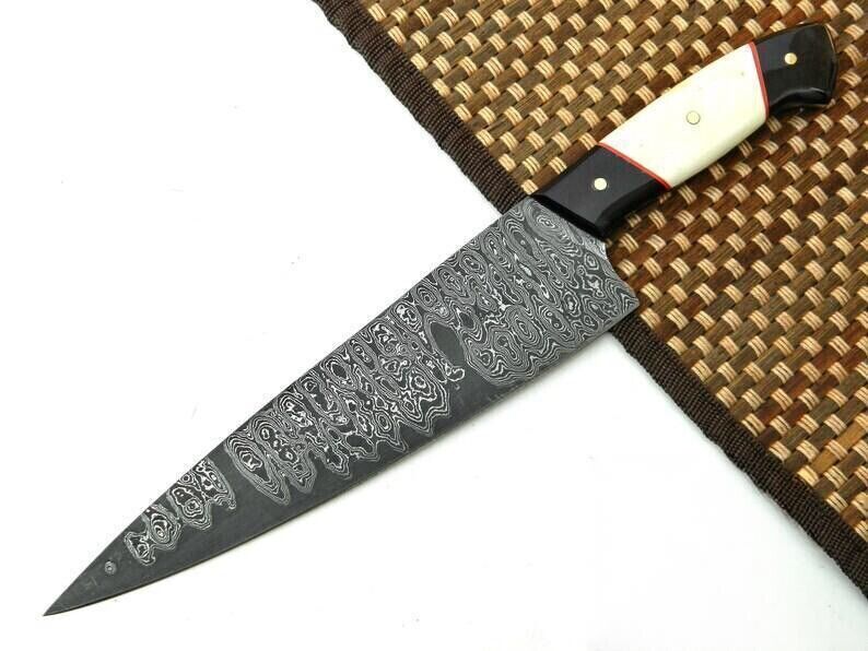 Custom handmade 7-inch Damascus steel chef’s knife with camel bone and resin handle, ideal for precision slicing and professional kitchen use