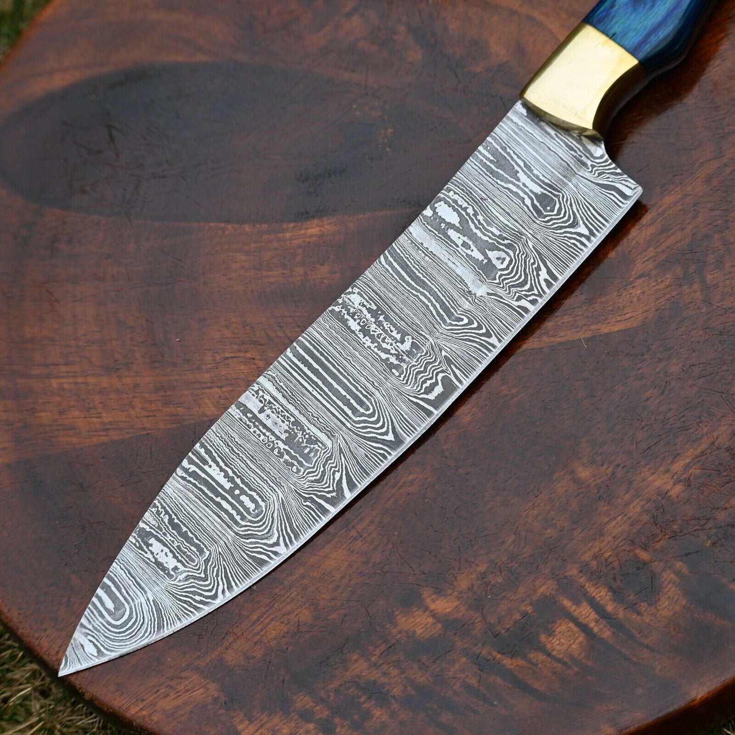 "Custom handmade Damascus chef knife, 7-inch blade with pakkawood handle, perfect for precise slicing and chopping