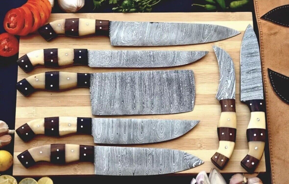 Custom handmade Damascus chef knife set with 9 to 13-inch hand-forged blades, featuring premium rosewood and olive wood handles, ideal for professional cooking