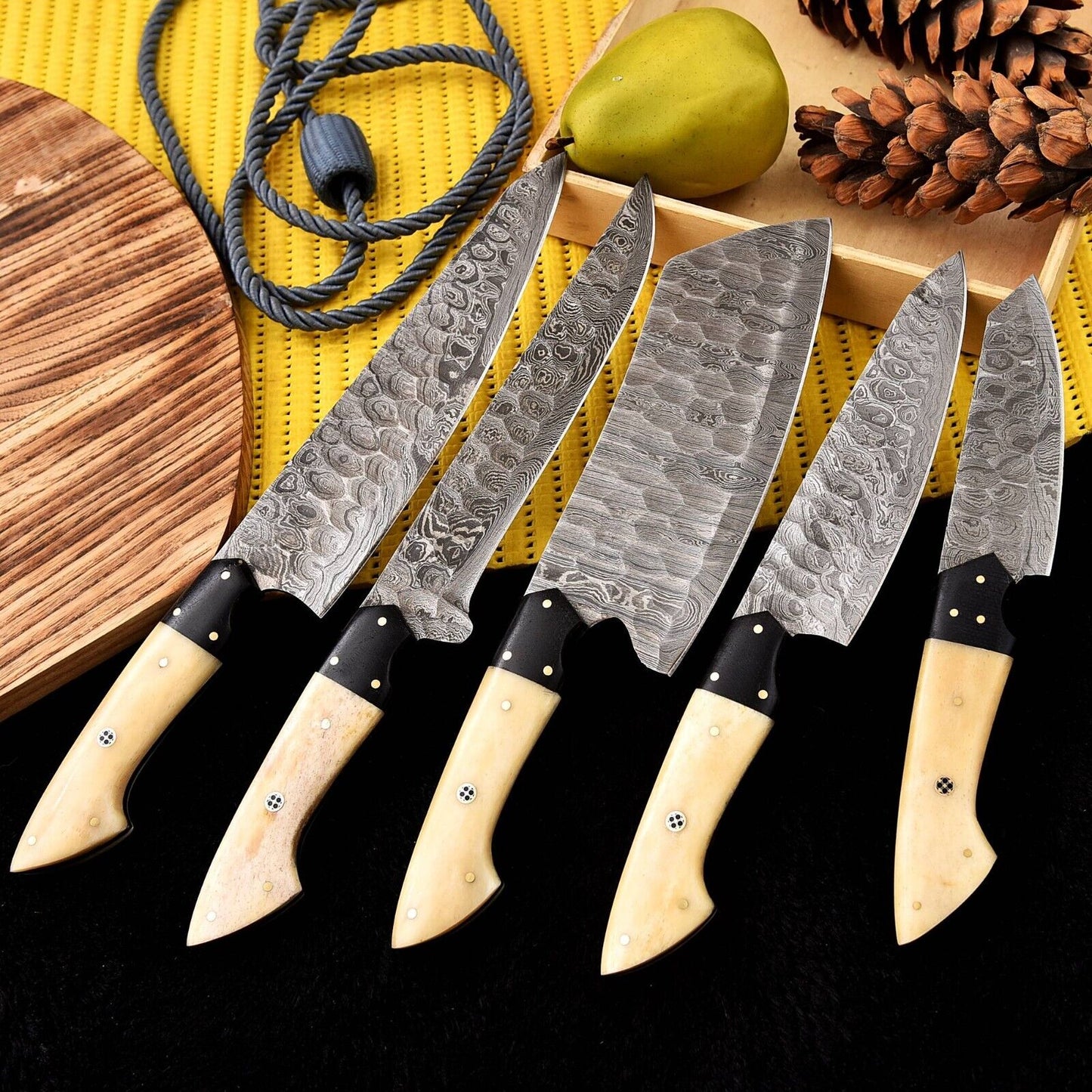 Custom handmade Damascus kitchen knife set with camel bone and resin handles, featuring hand-forged Damascus steel blades ranging from 9 to 13 inches in length