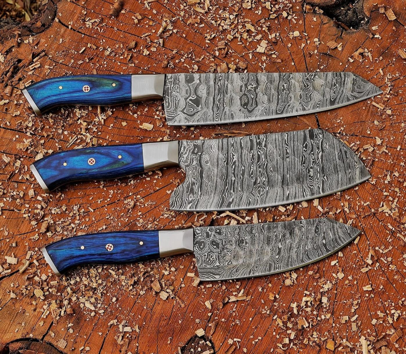 Custom handmade Damascus knife set with hand-forged blades and pakkawood handles."