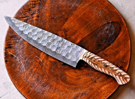 Custom handmade Damascus steel chef knife with 7-inch blade and pain cone handle