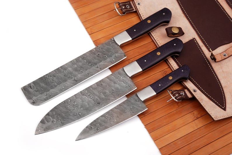 "Custom handmade Damascus steel chef knife with an 8-inch blade and buffalo horn handle"