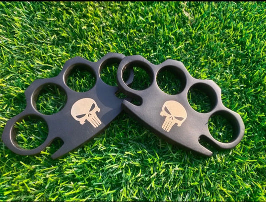 Custom handmade black steel engraved knuckle duster with a solid brass core and leather case for self-defense