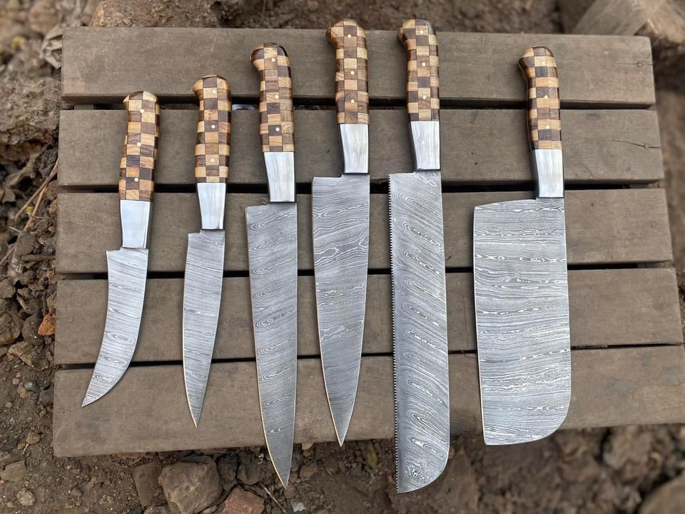 Custom handmade kitchen knife set with an 8-inch hand-forged Damascus steel blade, ergonomic handle made of rosewood and olive wood, and steel bolster