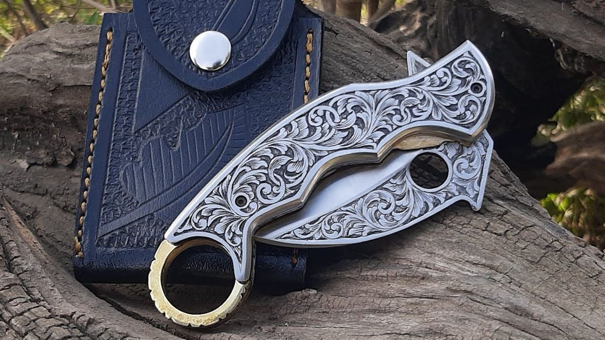 Custom handmade engraving folding knife