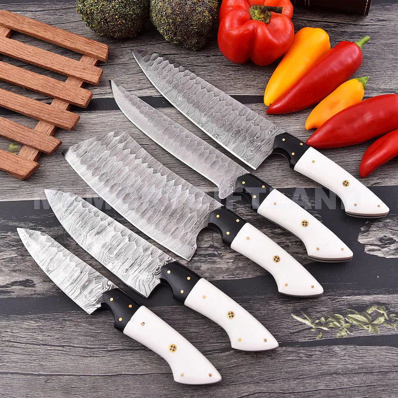 "Handcrafted Damascus cooking knife set with forged steel blades and resin handles"