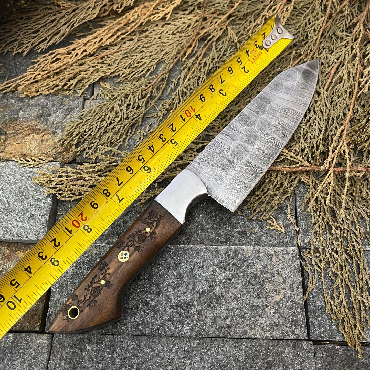 Handcrafted knife set featuring Damascus steel blades and rosewood handles, perfect for kitchen or collection