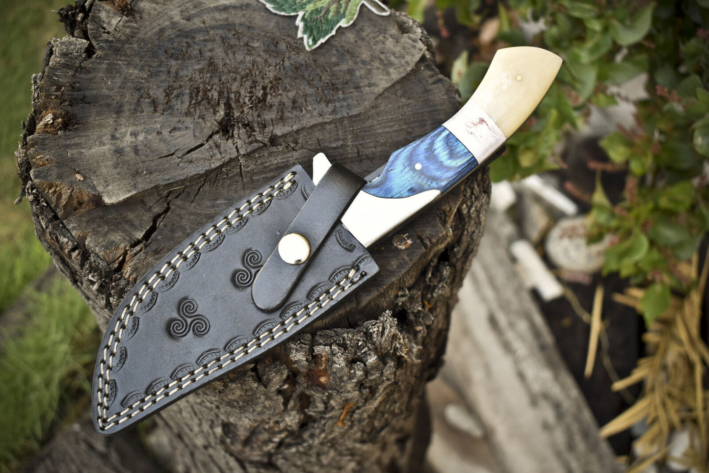 Handmade J2 steel hunting knife with pakkawood and camel bone handle, perfect for hunting and survival.