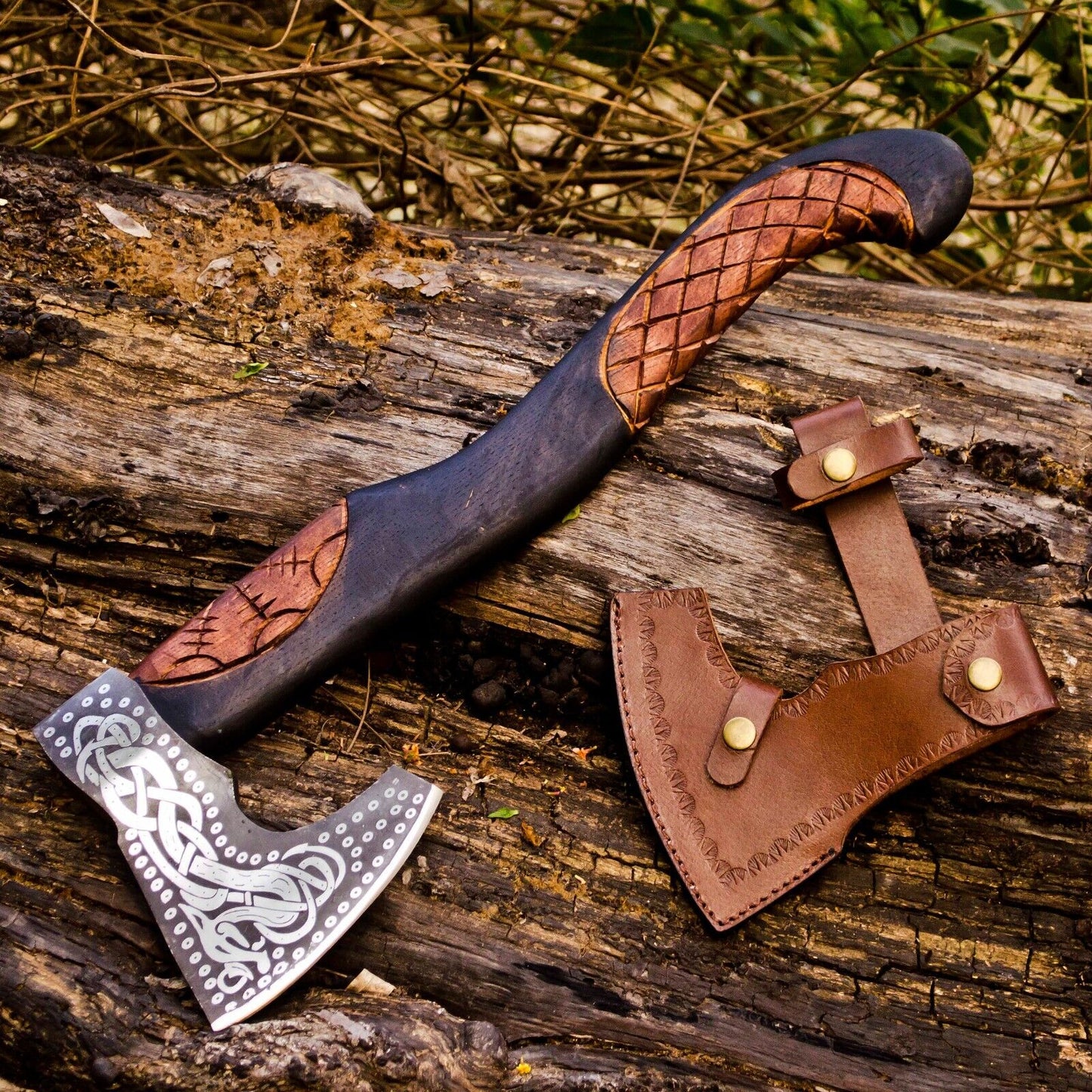 Handmade Viking axe with leather sheath and ergonomic handle, perfect for historical weapon collectors
