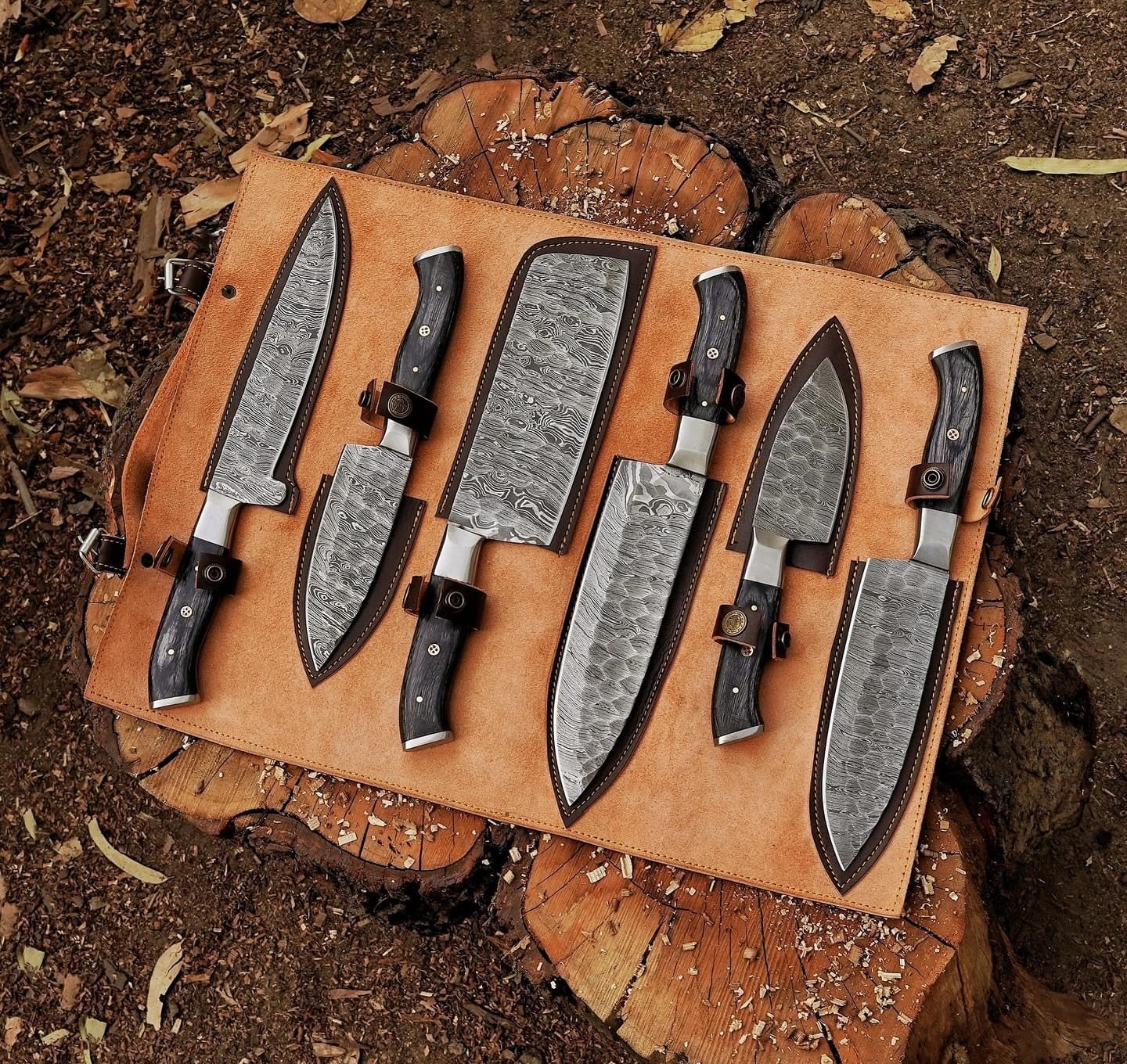 High-quality custom Damascus steel knife set featuring various blade lengths and ergonomic pakkawood handles for enhanced grip and control