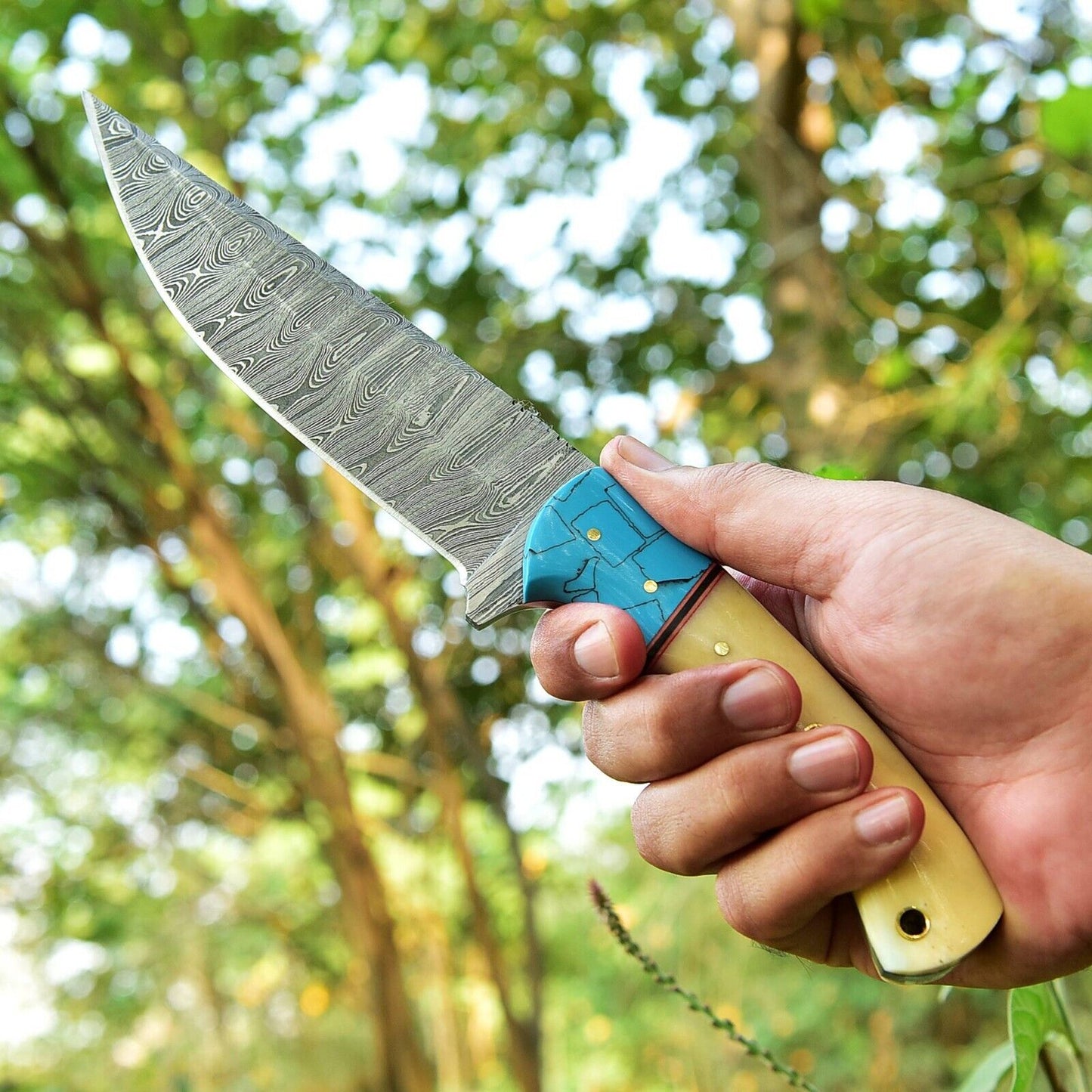 Premium Damascus steel hunting knife with camel bone and resin handle, includes leather sheath