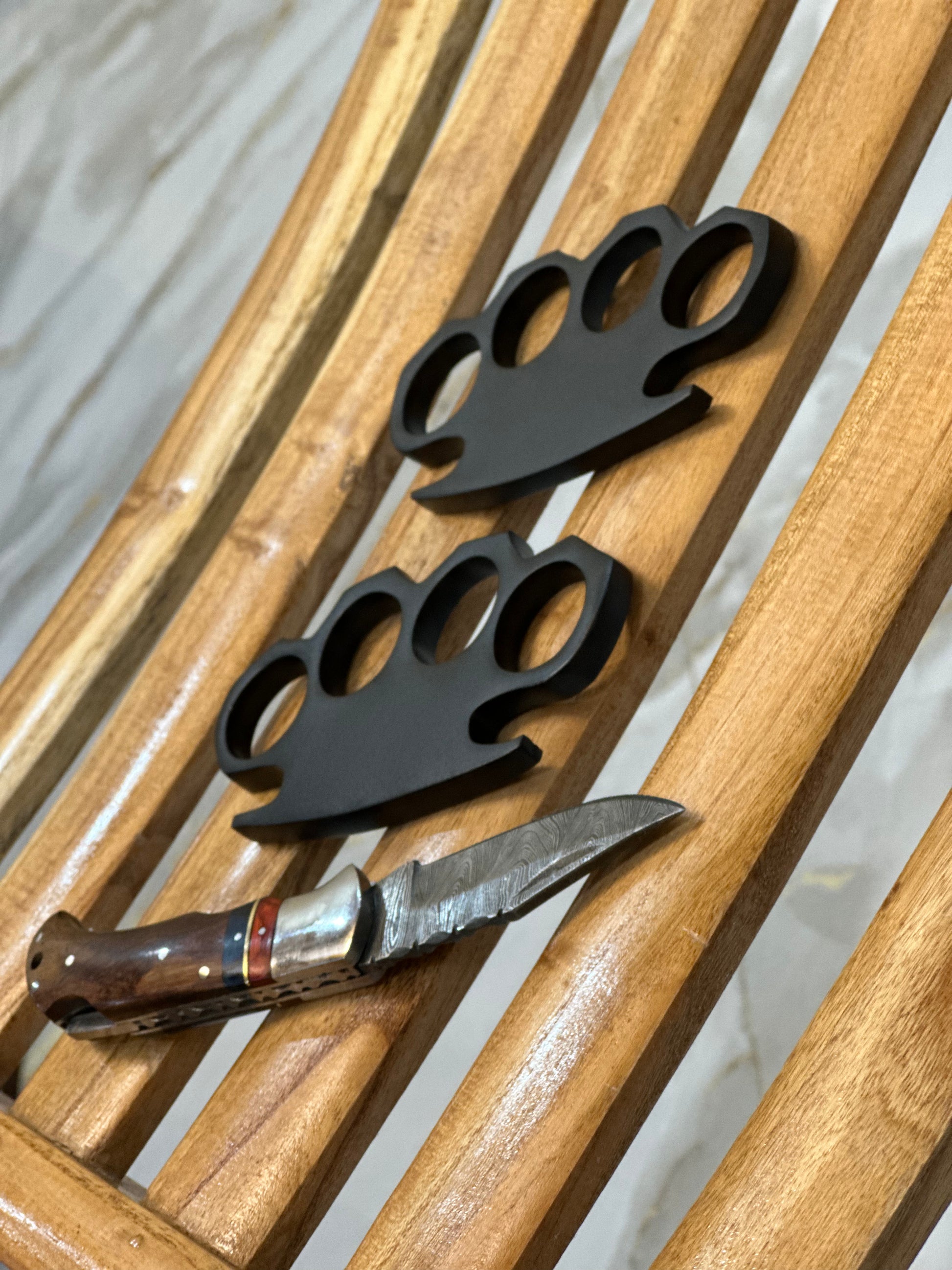 Solid brass black knuckle duster with integrated pocket knife and leather case