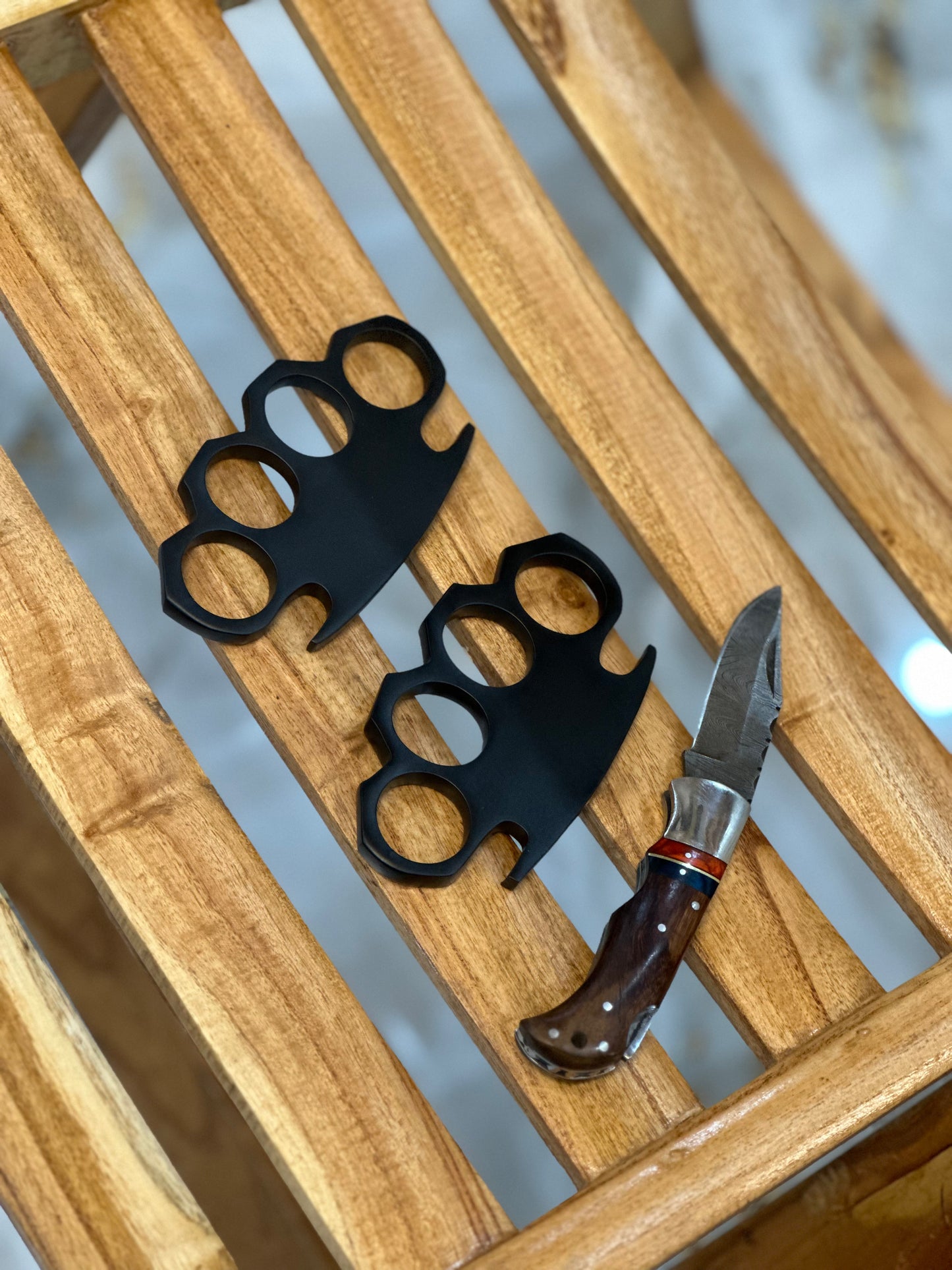 Unique brass knuckles with pocket knife and belt loop leather case for self-defense and everyday carry