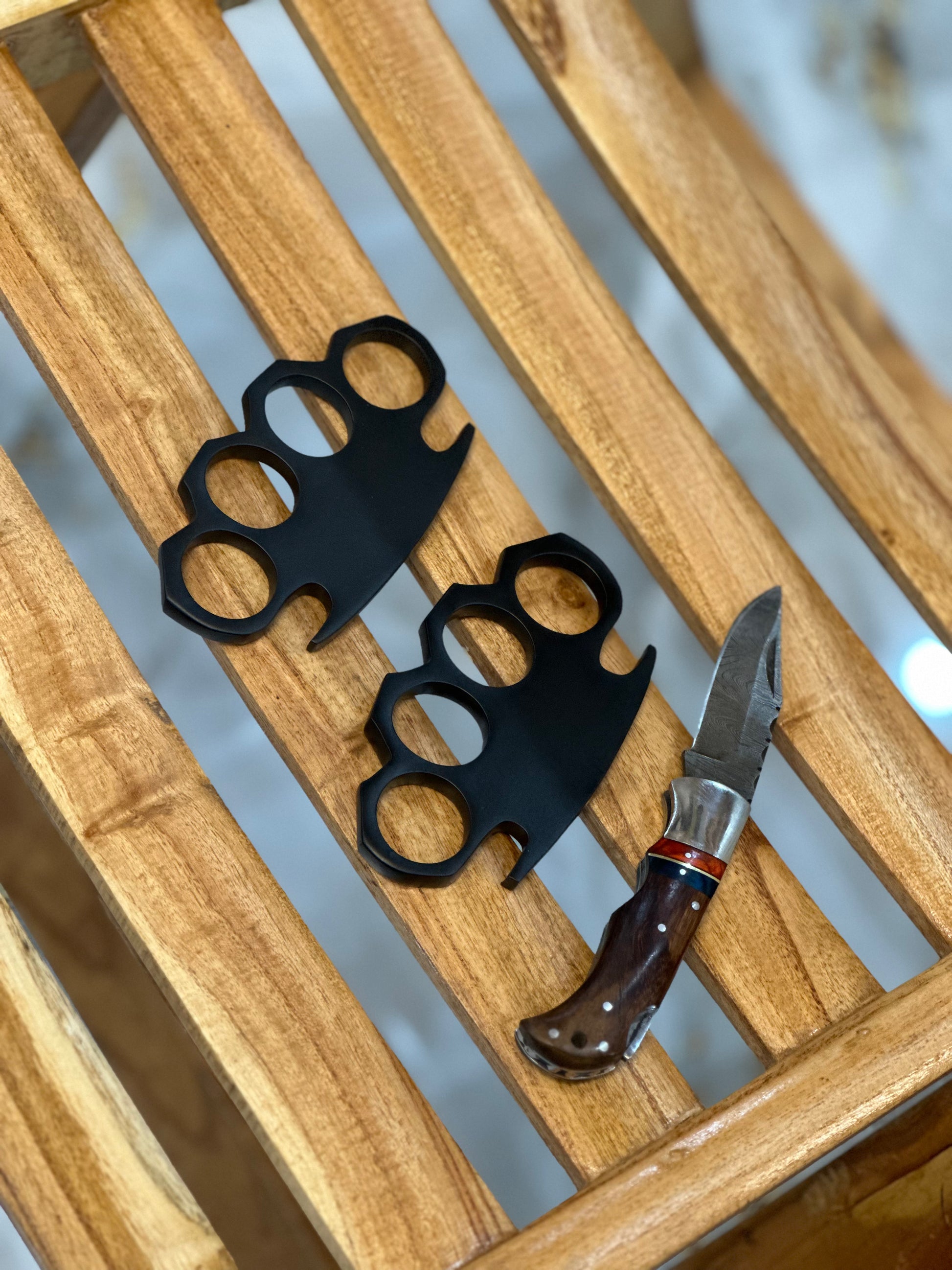 Unique brass knuckles with pocket knife and belt loop leather case for self-defense and everyday carry