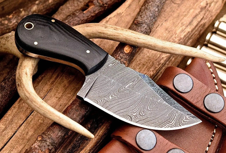 Custom handmade Damascus steel skinning knife