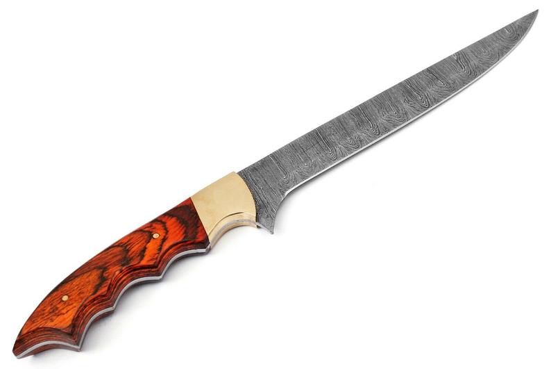 Close-up of a 12-inch Damascus steel fillet knife with an exotic wood handle, brass bolster, and leather sheath