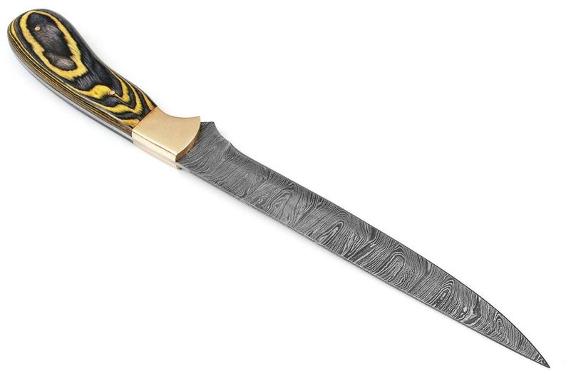 Elegant 12-inch Damascus fillet knife with Pakka wood handle, sharp edge blade, and brass bolster, shown with a leather sheath