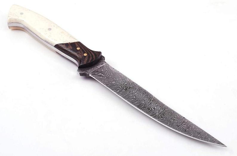 Elegant 12-inch Damascus fillet knife with bone and exotic wood handle, brass bolster, and protective leather sheath