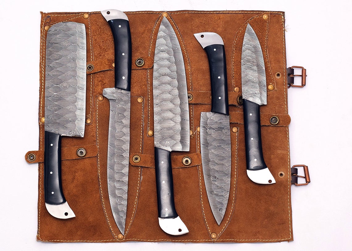 Elegant custom handmade Damascus steel knife sets with 9" to 13" blades, featuring durable resin handles for comfort and style in the kitchen