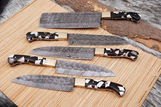 Luxurious Damascus kitchen knife set with exotic wood handles and custom twisted pattern blades, perfect for gourmet cooking