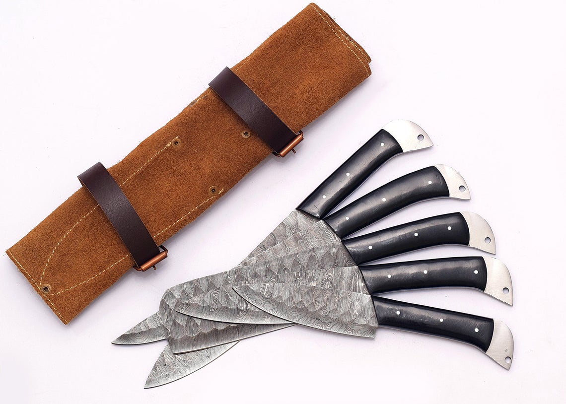 Stunning custom handmade Damascus steel knife sets with hand-forged blades measuring 9" to 13", featuring ergonomic resin handles for optimal grip and performance