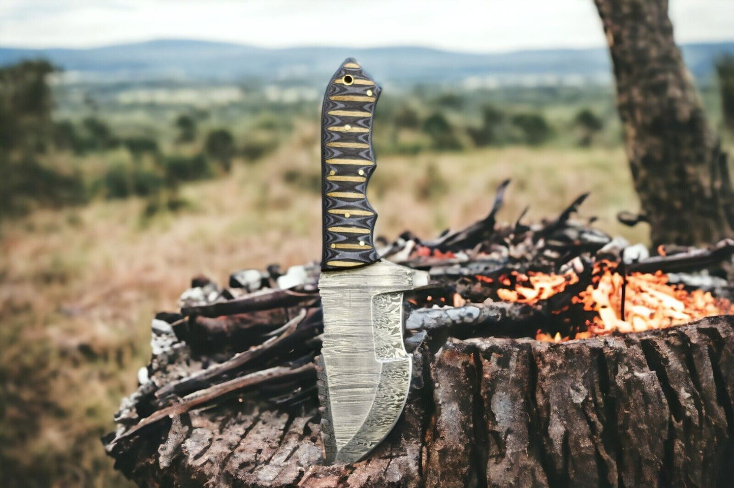 10-inch forged Damascus steel hunting tracker knife with ergonomic full tang handle.