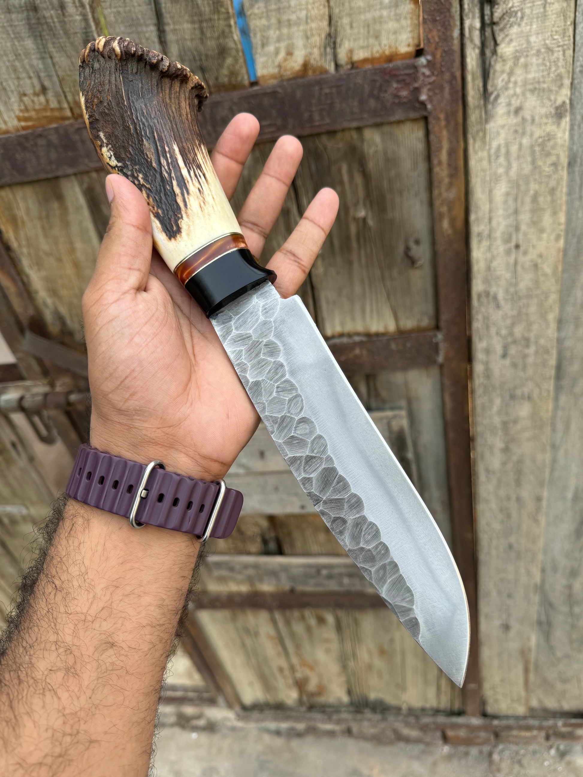 13-inch custom Bowie knife featuring a high-quality D2 steel blade, stag crown handle, and a handcrafted leather sheath