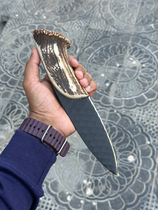 Hand forged steel hunting knife