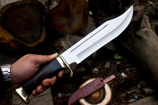 Crocodile Dundee Bowie Knife with brass guard and buffalo horn handle, featuring a leather sheath