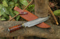 Custom handmade Damascus steel Bowie knife with a Damascus steel guard, rosewood, and brass handle, including a leather sheath.