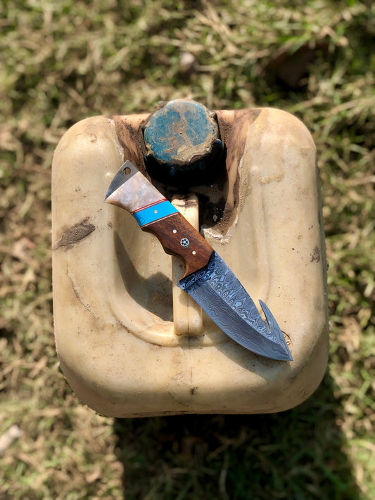 The Hunter's Edge: 8.25-Inch Gut Hook Skinning Hunting Knife with Raindrops Damascus Steel Blade, Rosewood and Epoxy Resin Handle