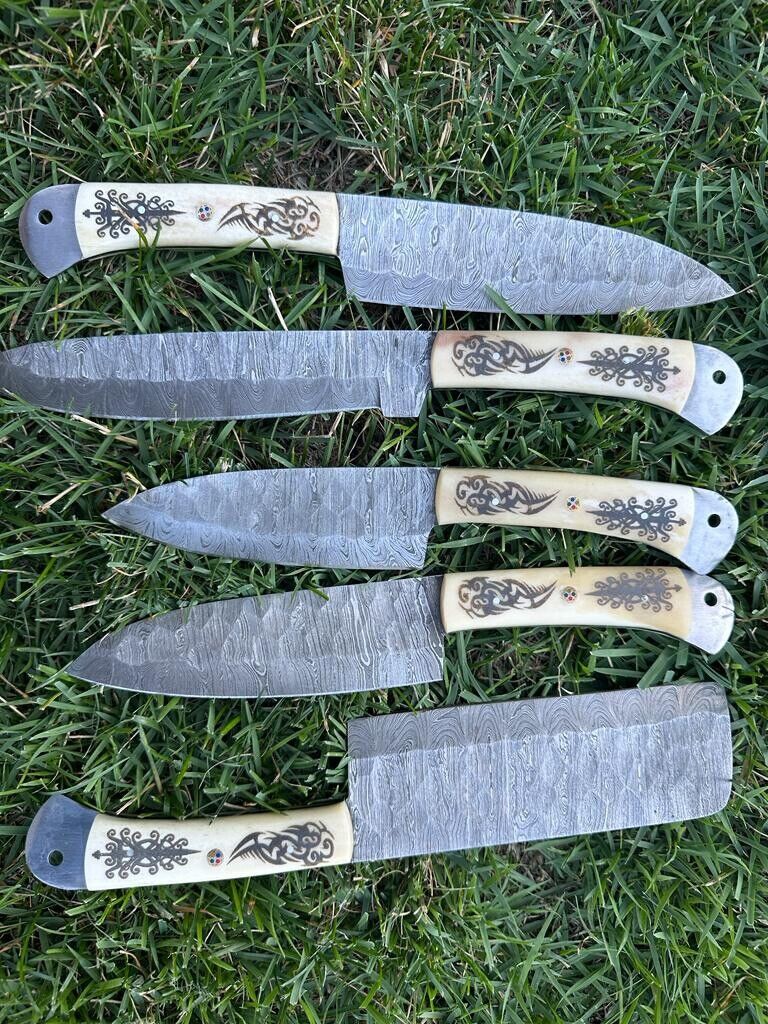 Artisanal Damascus knife kitchen set showcasing unique camel bone handles, designed for professional and home chefs alike