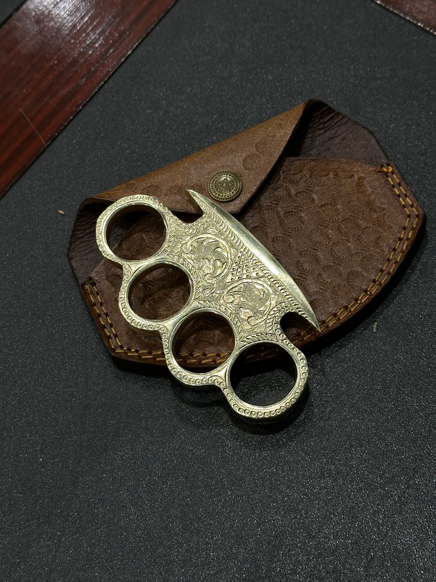 Close-up of Custom Engraved Brass Knuckles