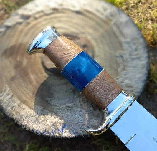Crocodile Dundee Bowie Knife by Paul Hogan with a 16-inch 440C steel blade, olive wood and resin handle, steel guard, and a beautiful leather sheath