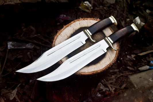 Custom 16-inch Crocodile Dundee Bowie Knife by Paul Hogan with a 440C steel blade, leather and buffalo horn handle, brass guard, and a beautiful leather sheath