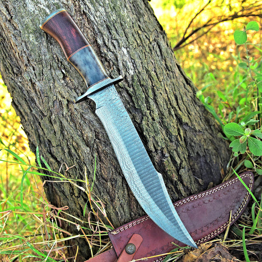 Custom 16-inch Damascus steel Bowie knife with camel bone and rosewood handle.