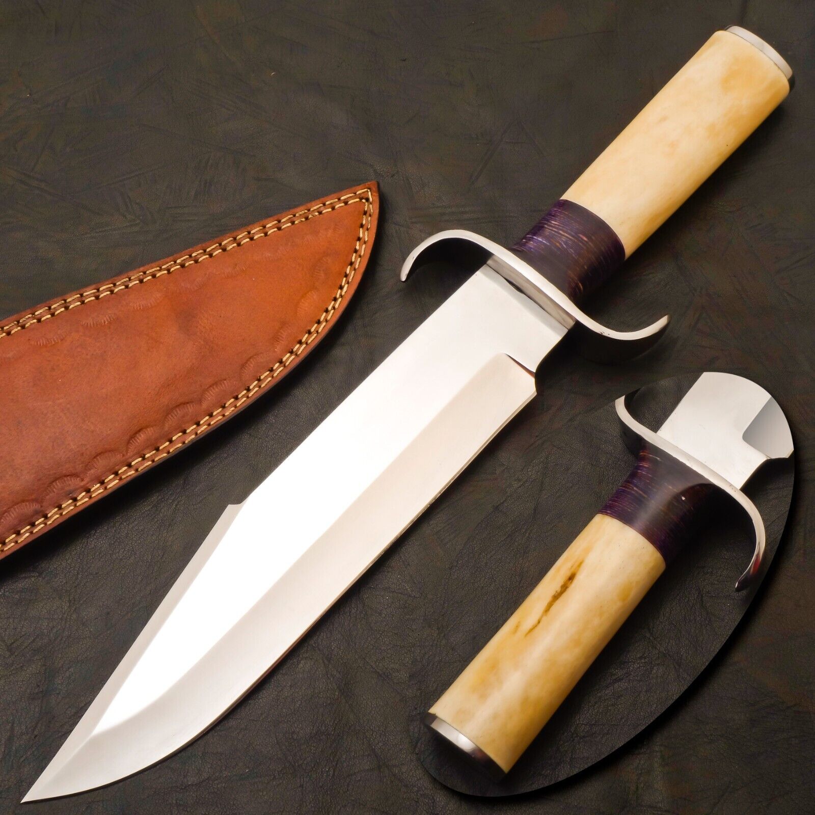 Custom Bowie knife with J2 steel blade, camel bone and pakkawood handle.