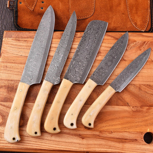 Custom handmade Damascus knife set with camel bone handles and hand-forged blades ranging from 9 to 13 inches, displayed with a sharp, durable finish.