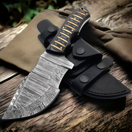 Custom handmade Damascus steel Tom Brown tracker knife with full tang and leather sheath.