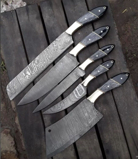 Custom handmade Damascus steel kitchen knives set with pakkawood and buffalo horn handles, including leather sheath