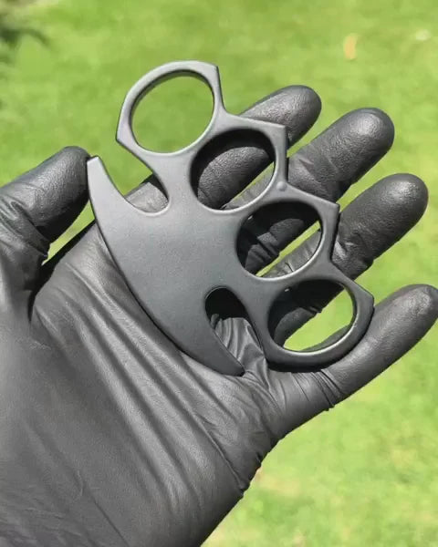 Custom handmade black knuckle duster with belt loop leather case