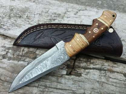 inches Damacus steel fixed blade hunting knife. Rose wood and olive wood handle.